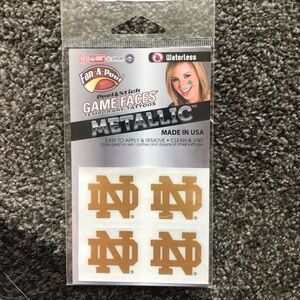 Notre dame gameday face tattoo sparkly shiny sticker— gold metallic logo